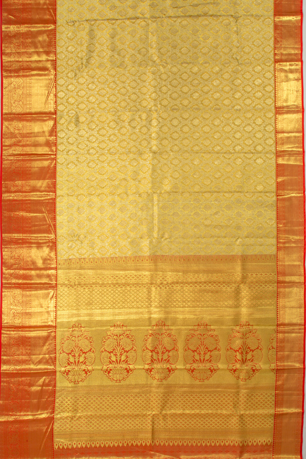 Taranga Kanchi Silk Tissue Brocade Gold Saree