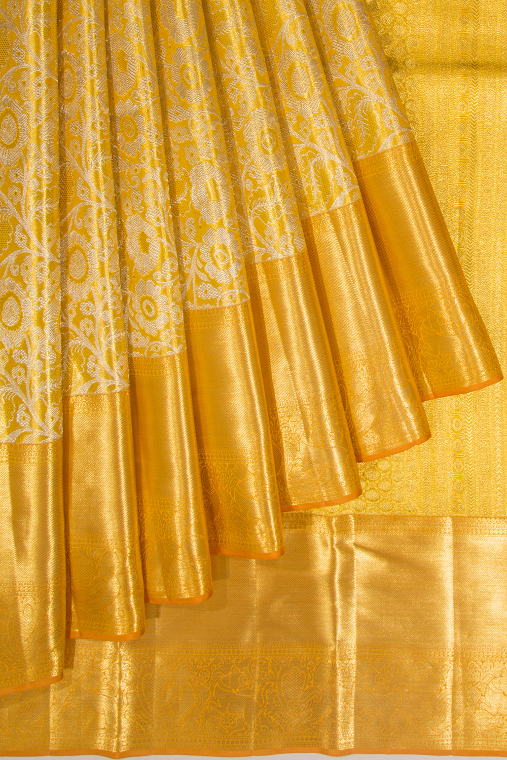 Taranga Kanchi Silk Tissue Jaal Gold Saree