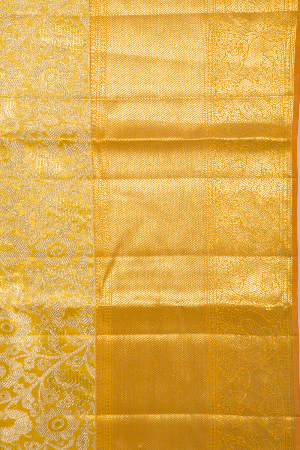 Taranga Kanchi Silk Tissue Jaal Gold Saree