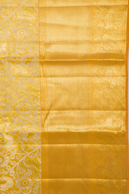 Taranga Kanchi Silk Tissue Jaal Gold Saree