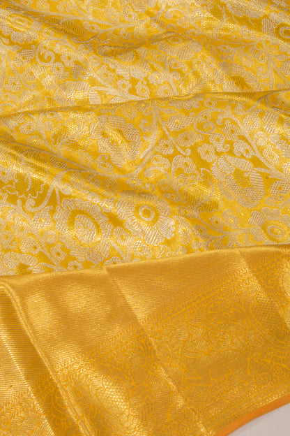 Taranga Kanchi Silk Tissue Jaal Gold Saree