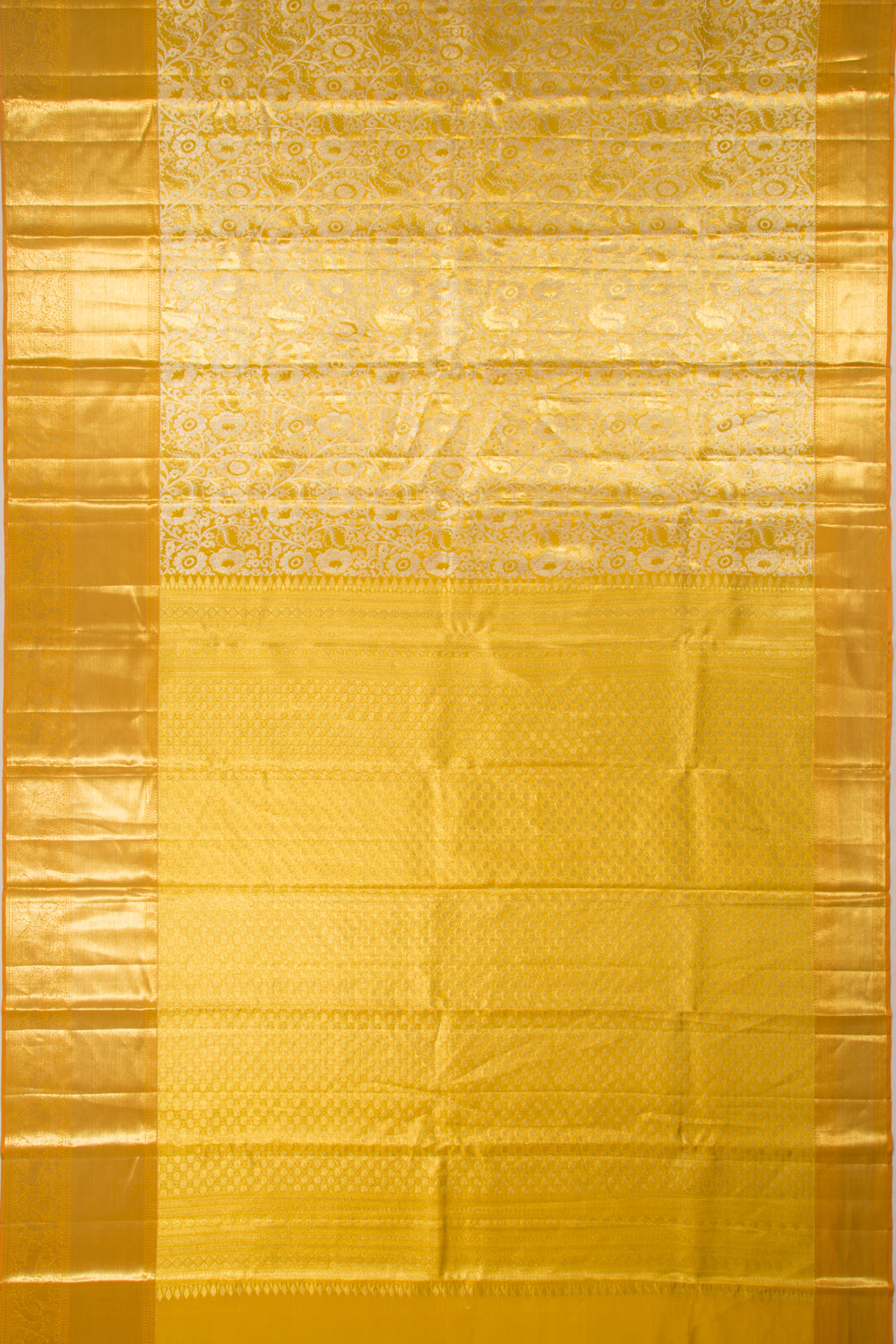 Taranga Kanchi Silk Tissue Jaal Gold Saree
