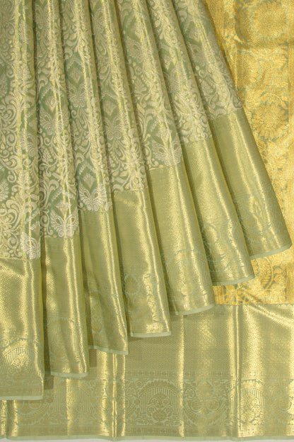 Taranga Kanchi Silk Tissue Jaal Pastel Green Saree