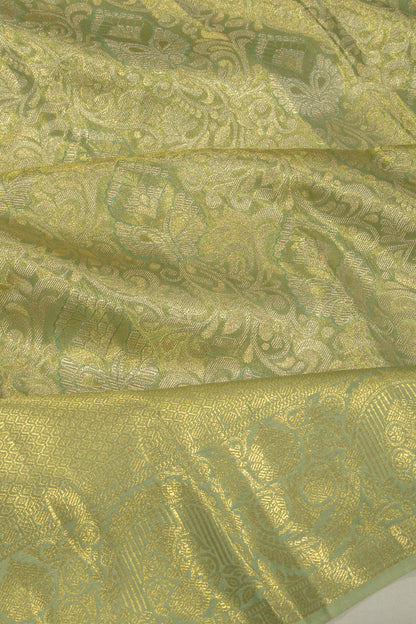 Taranga Kanchi Silk Tissue Jaal Pastel Green Saree