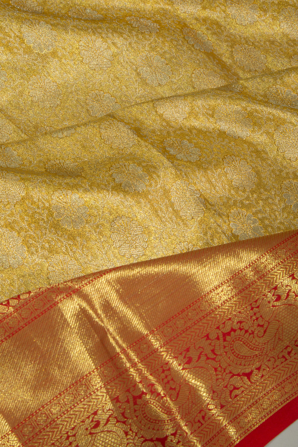 Taranga Kanchi Silk Tissue Brocade Gold Saree