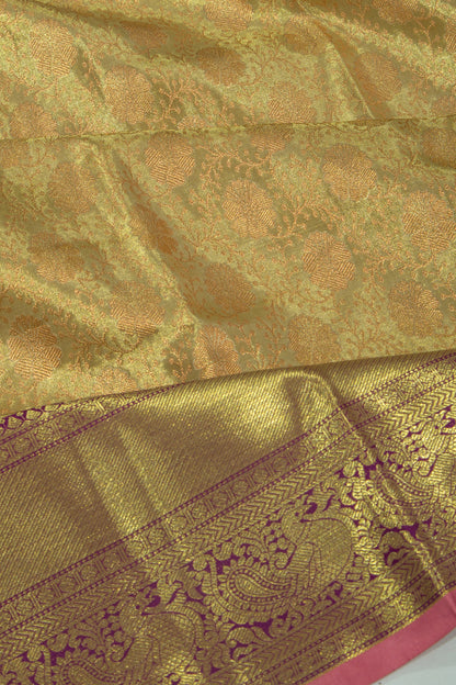 Taranga Kanchi Silk Tissue Brocade Green Saree