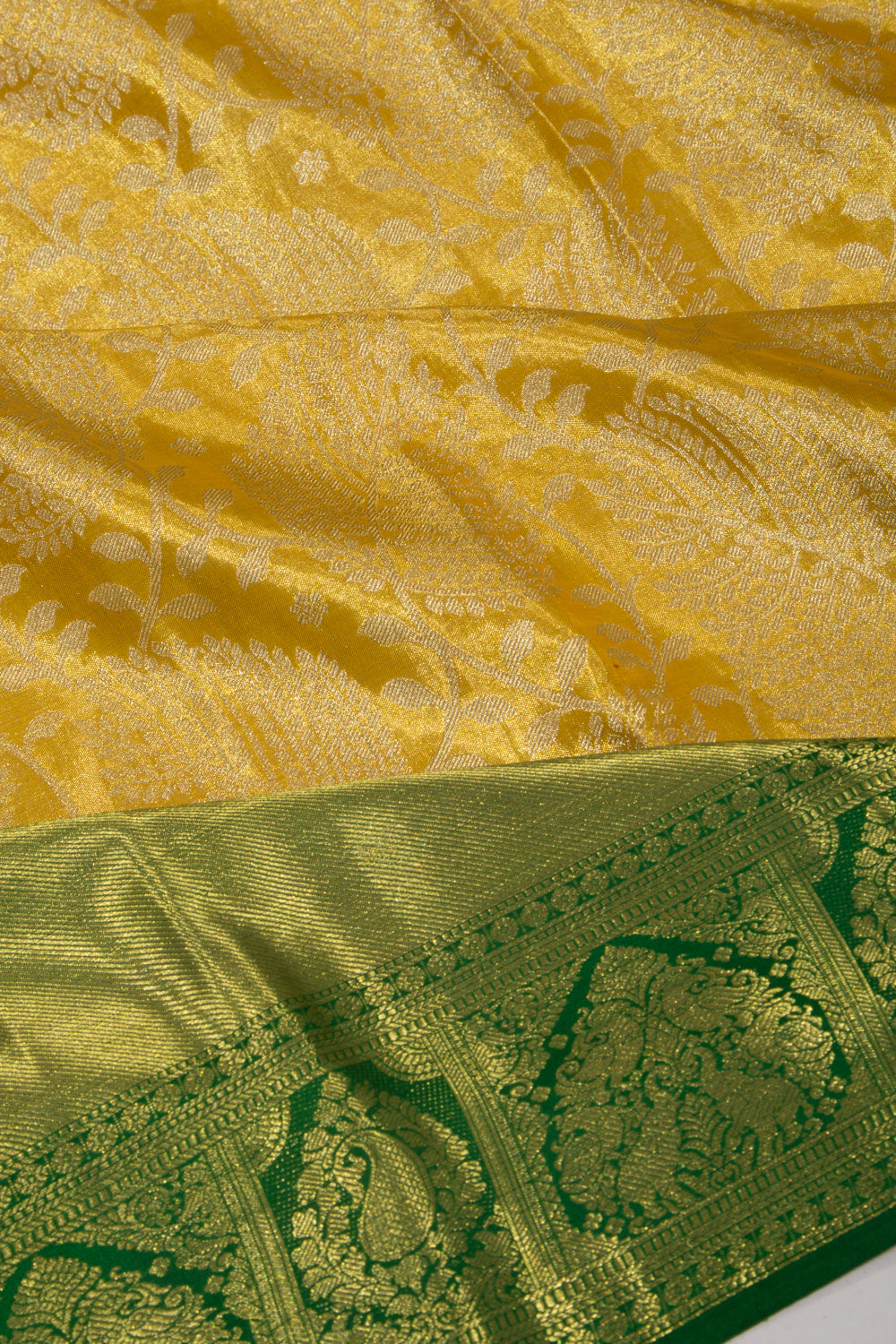 Taranga Kanchi Silk Tissue Jaal Yellow Saree