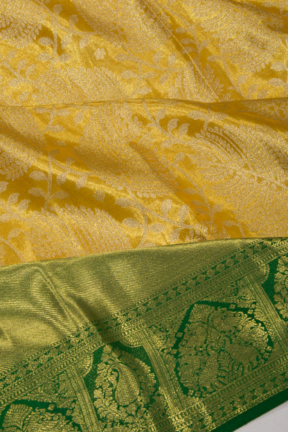 Taranga Kanchi Silk Tissue Jaal Yellow Saree