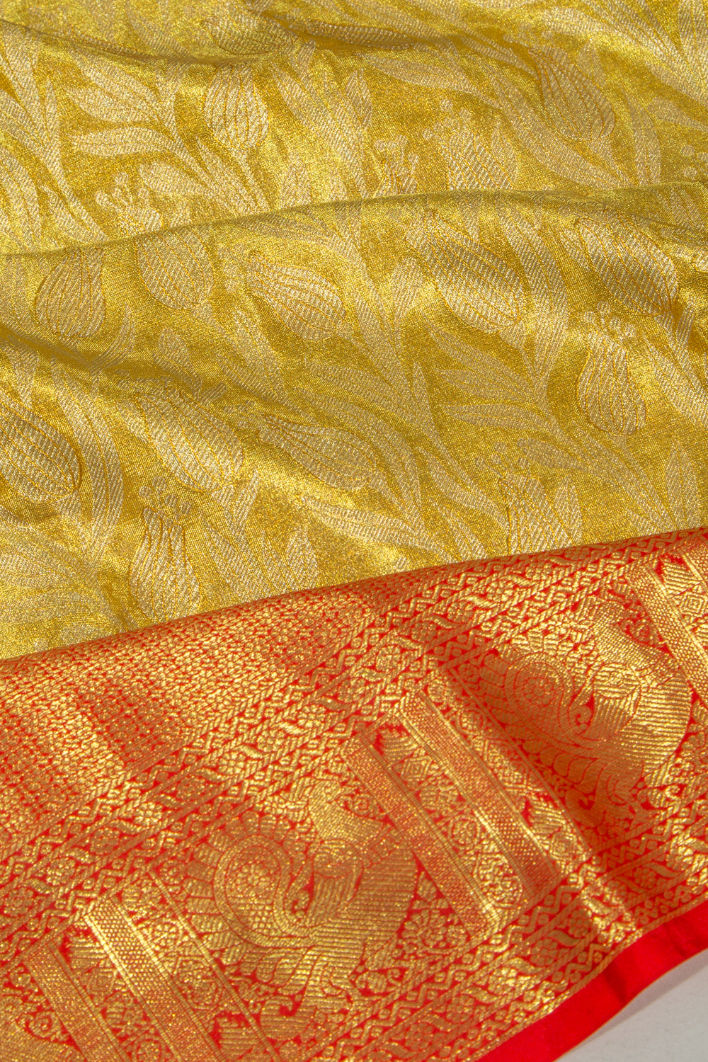 Taranga Kanchi Silk Tissue Jaal Gold Saree