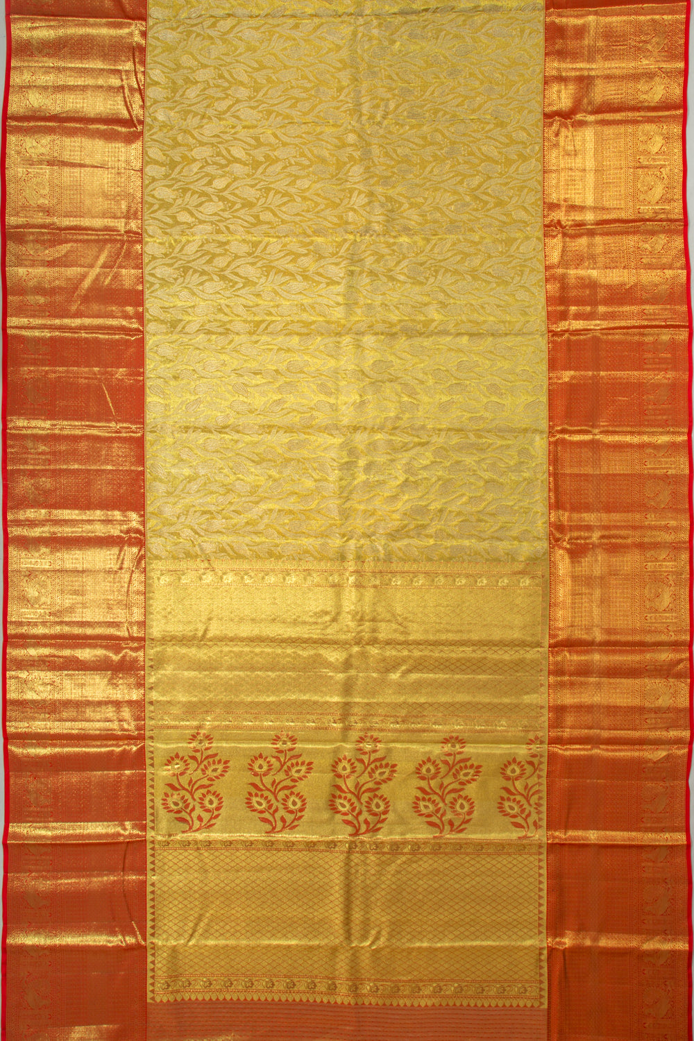 Taranga Kanchi Silk Tissue Jaal Gold Saree