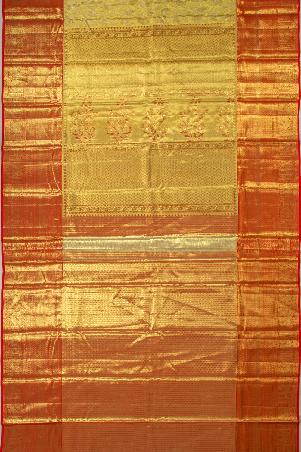 Taranga Kanchi Silk Tissue Jaal Gold Saree