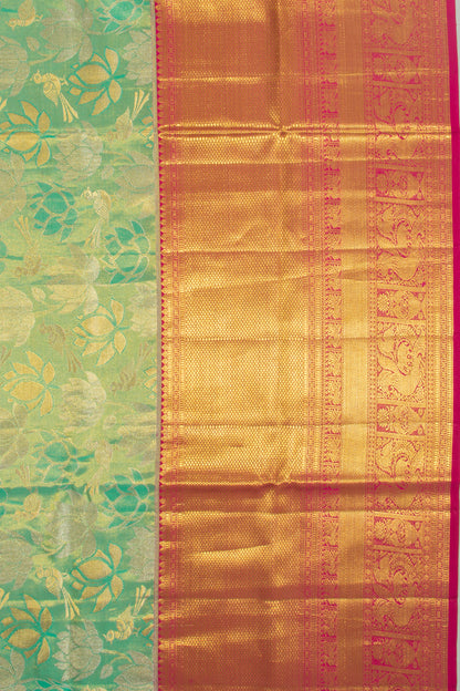 Taranga Kanchi Silk Tissue Brocade Green Saree
