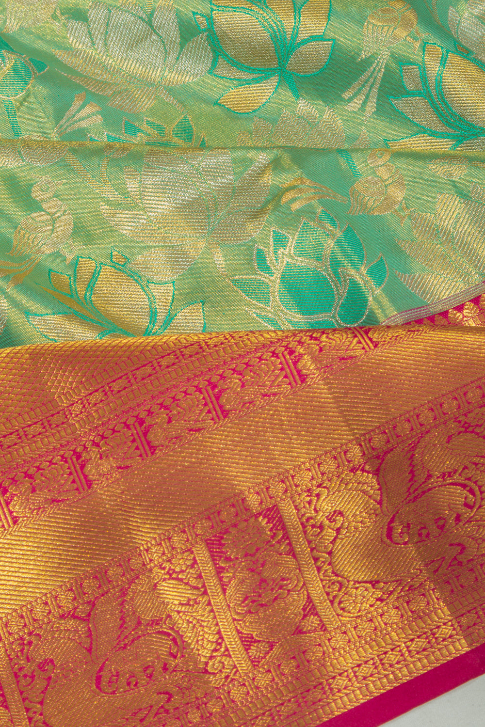 Taranga Kanchi Silk Tissue Brocade Green Saree