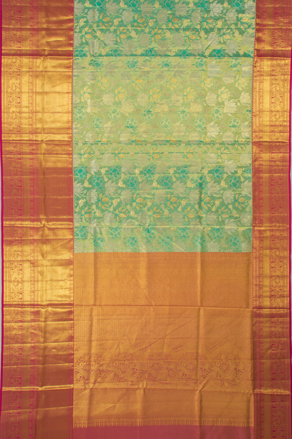 Taranga Kanchi Silk Tissue Brocade Green Saree