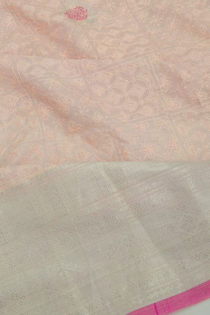 Linen Floral Embroidery Pastel Orange Saree