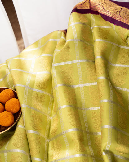 Kanchipuram Silk Checks And Butta Green Saree