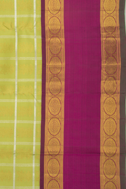 Kanchipuram Silk Checks And Butta Green Saree