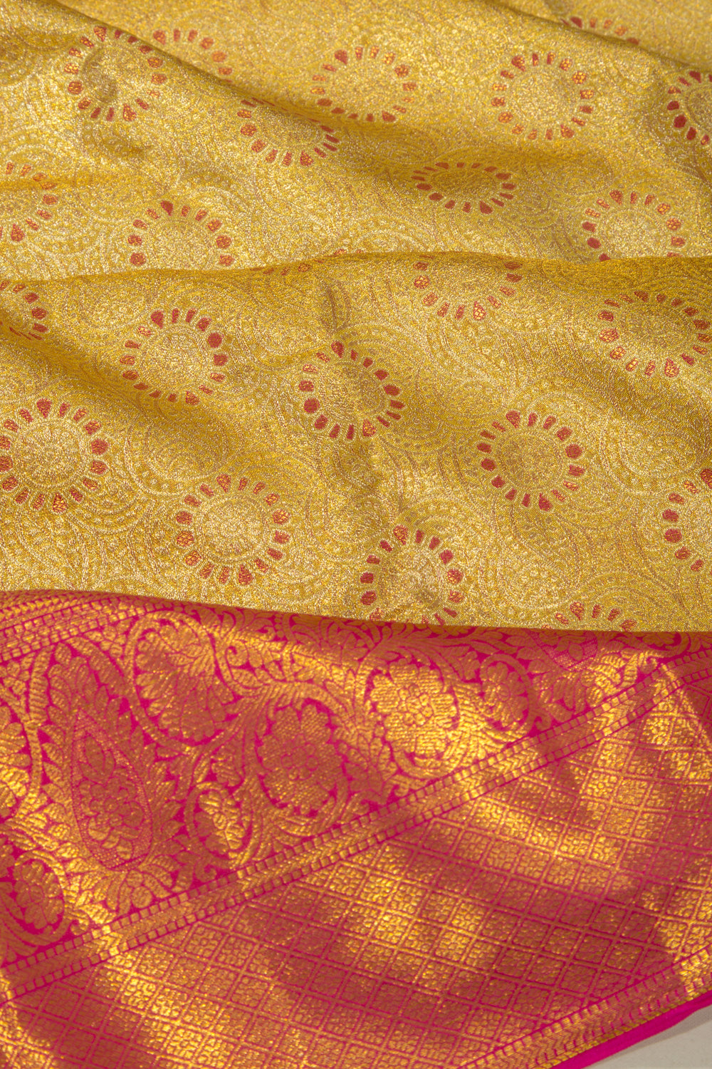 Taranga Kanchi Silk Tissue Brocade Gold Saree