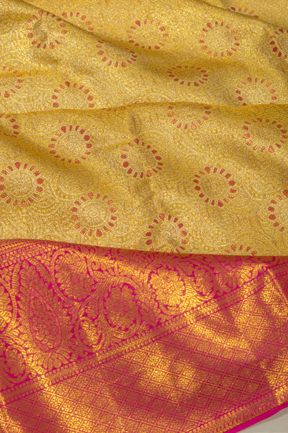 Taranga Kanchi Silk Tissue Brocade Gold Saree