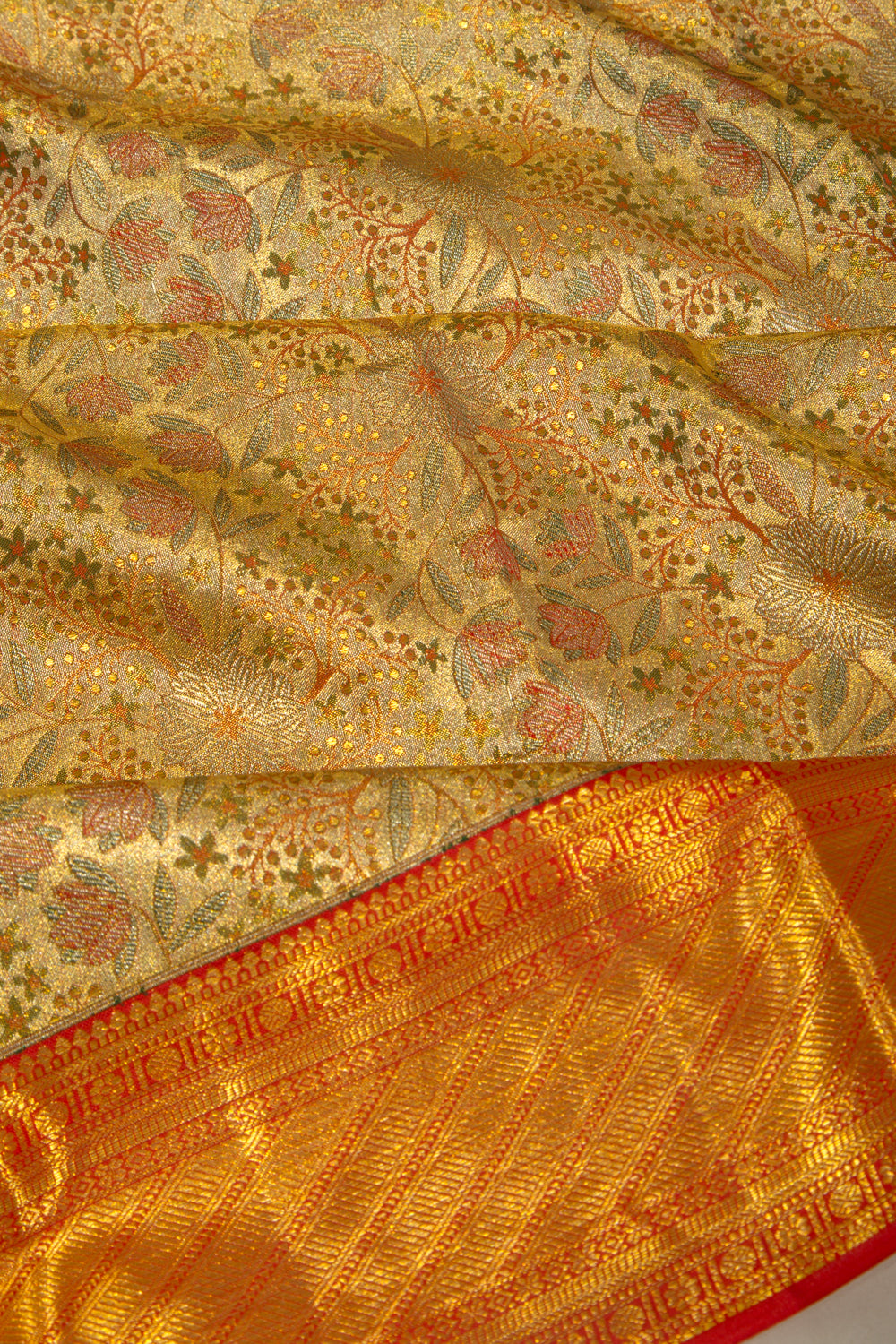 Taranga Kanchi Silk Tissue Brocade Gold Saree