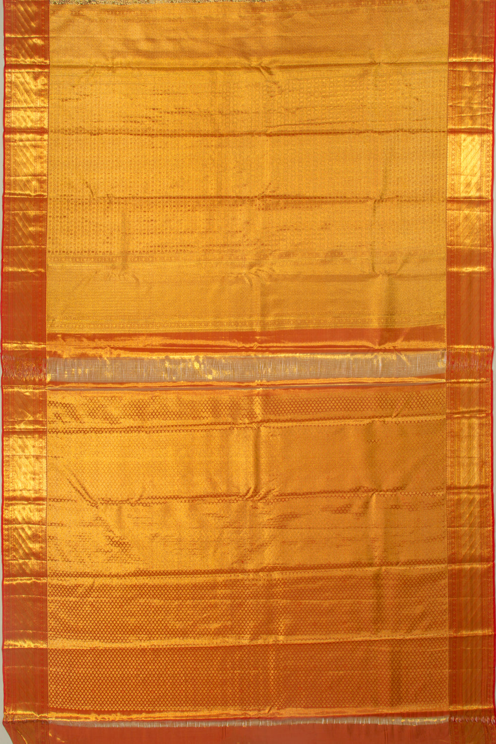 Taranga Kanchi Silk Tissue Brocade Gold Saree