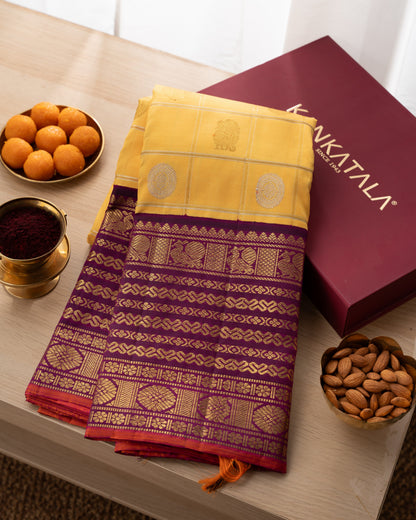 Kanchipuram Silk Checks And Butta Yellow Saree