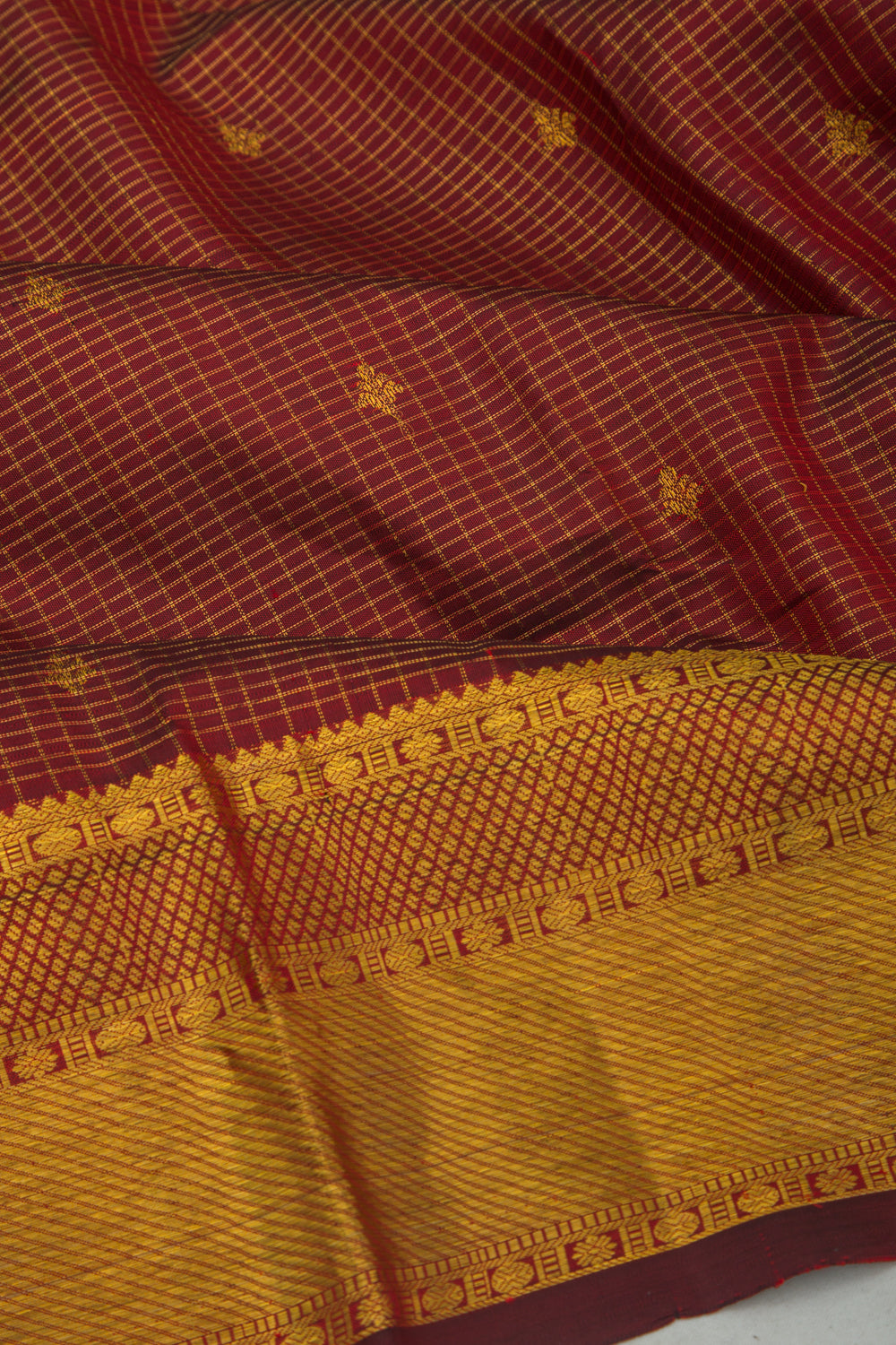 Kanchipuram Silk Checks And Butta Maroon Saree