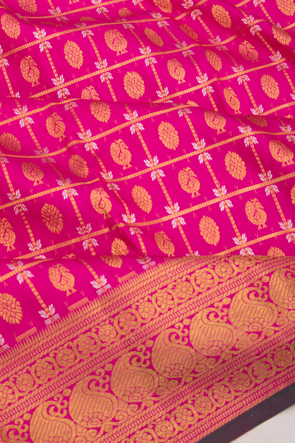 Kanchipuram Silk Checks And Butta Pink Saree