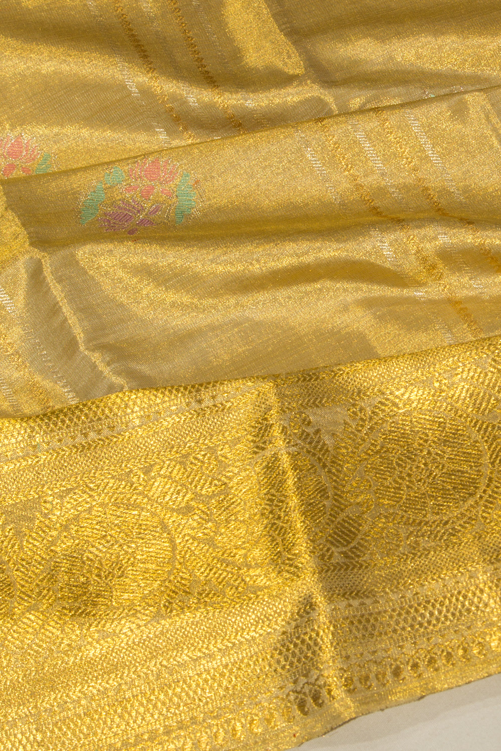 Kanchipuram Silk Tissue Vertical Lines And Butta Gold Saree