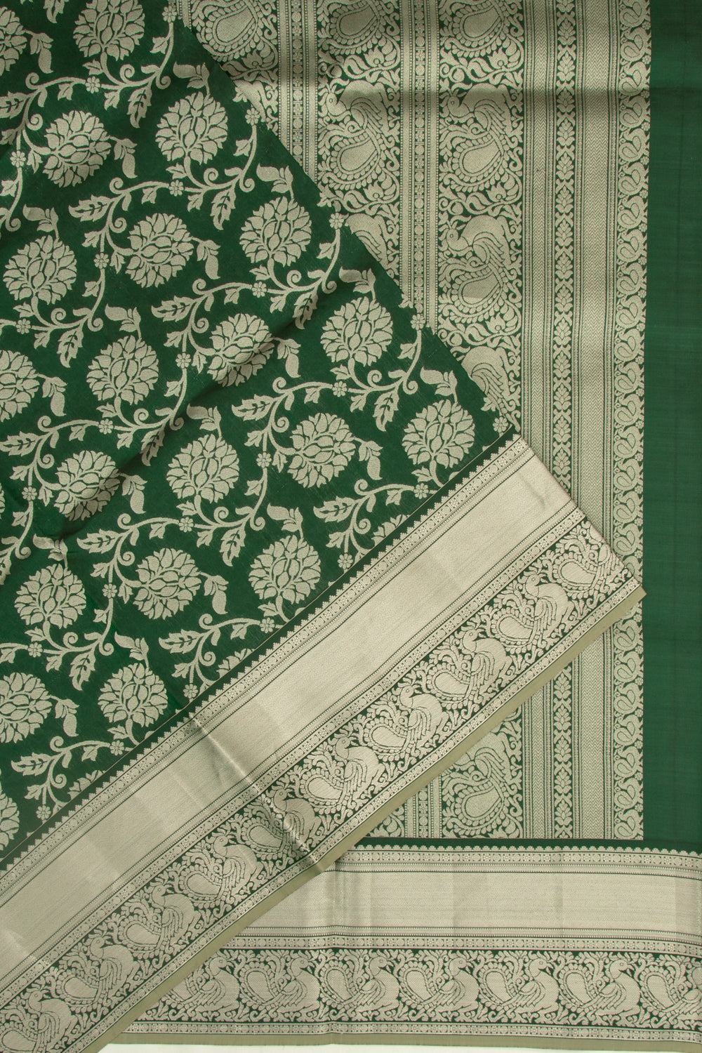 Taranga Kanchi Silk Jaal Bottle Green Saree
