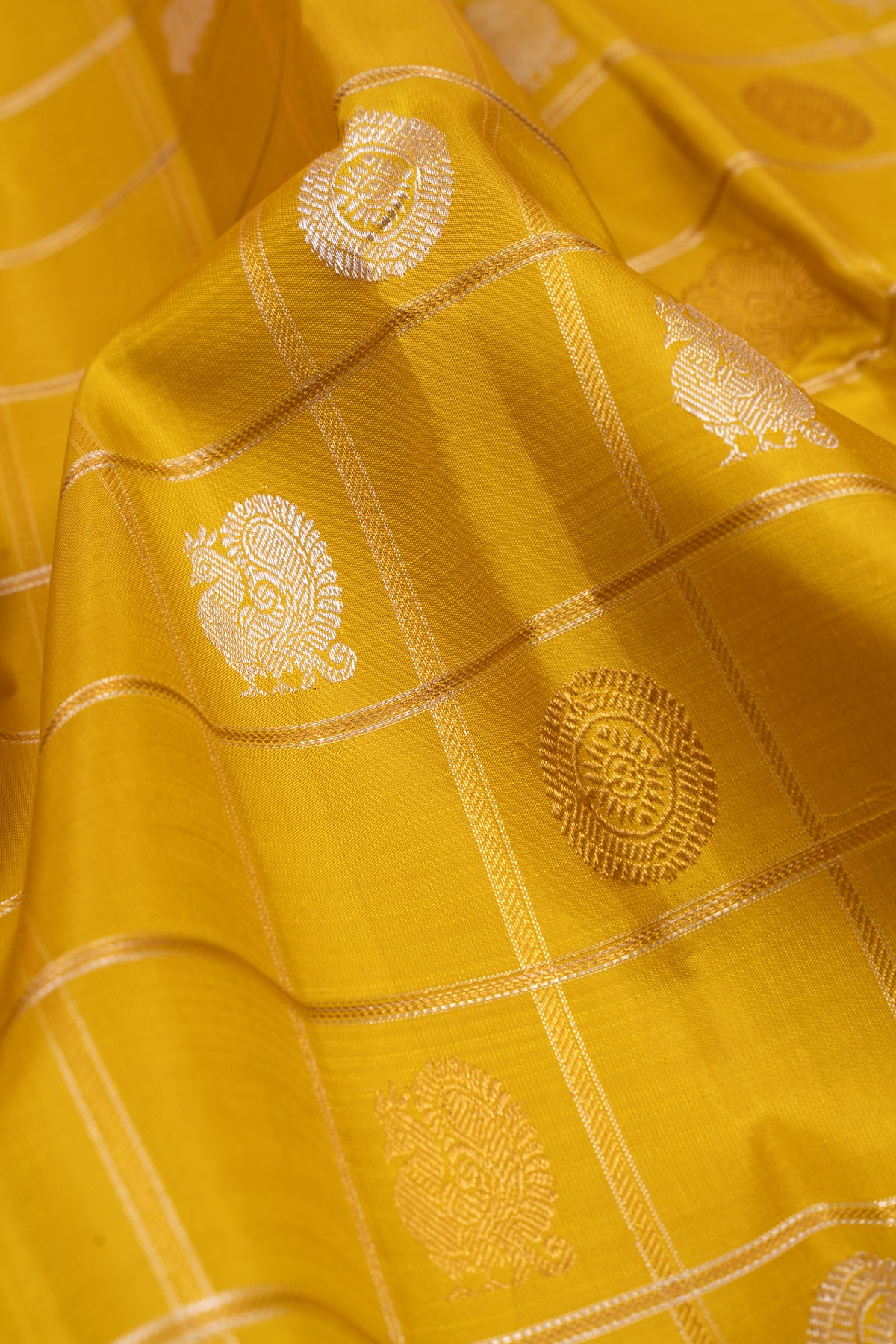 Kanchipuram Silk Checks And Butta Yellow Saree