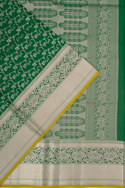 Taranga Kanchi Silk Jaal Bottle Green Saree