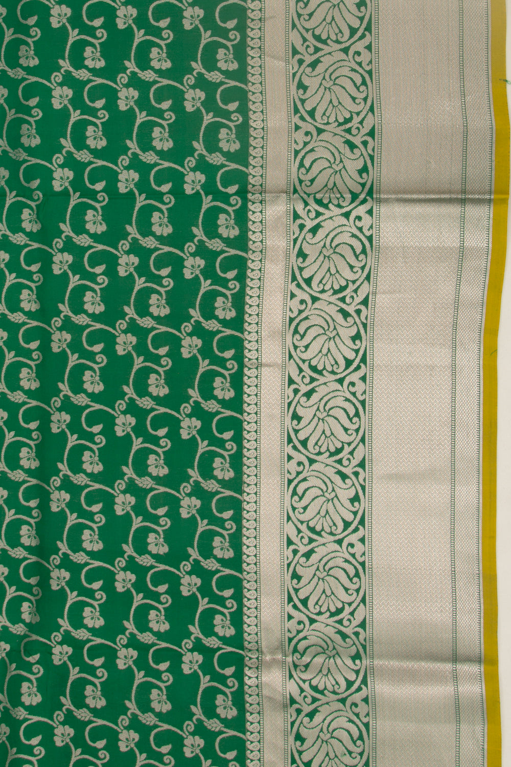 Taranga Kanchi Silk Jaal Bottle Green Saree