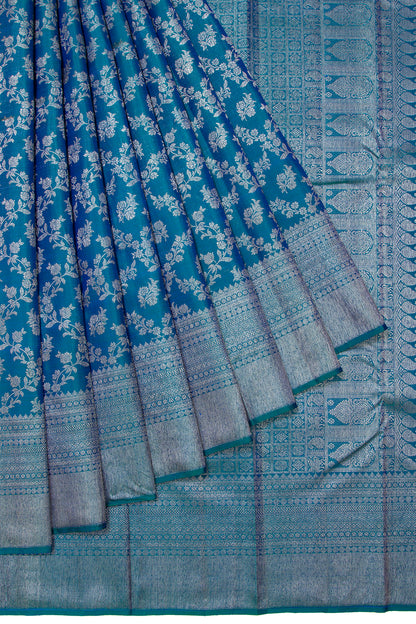 Kanchipuram Silk Jaal And Butta Teal Blue Saree