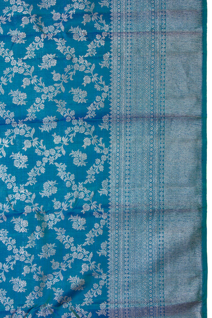 Kanchipuram Silk Jaal And Butta Teal Blue Saree