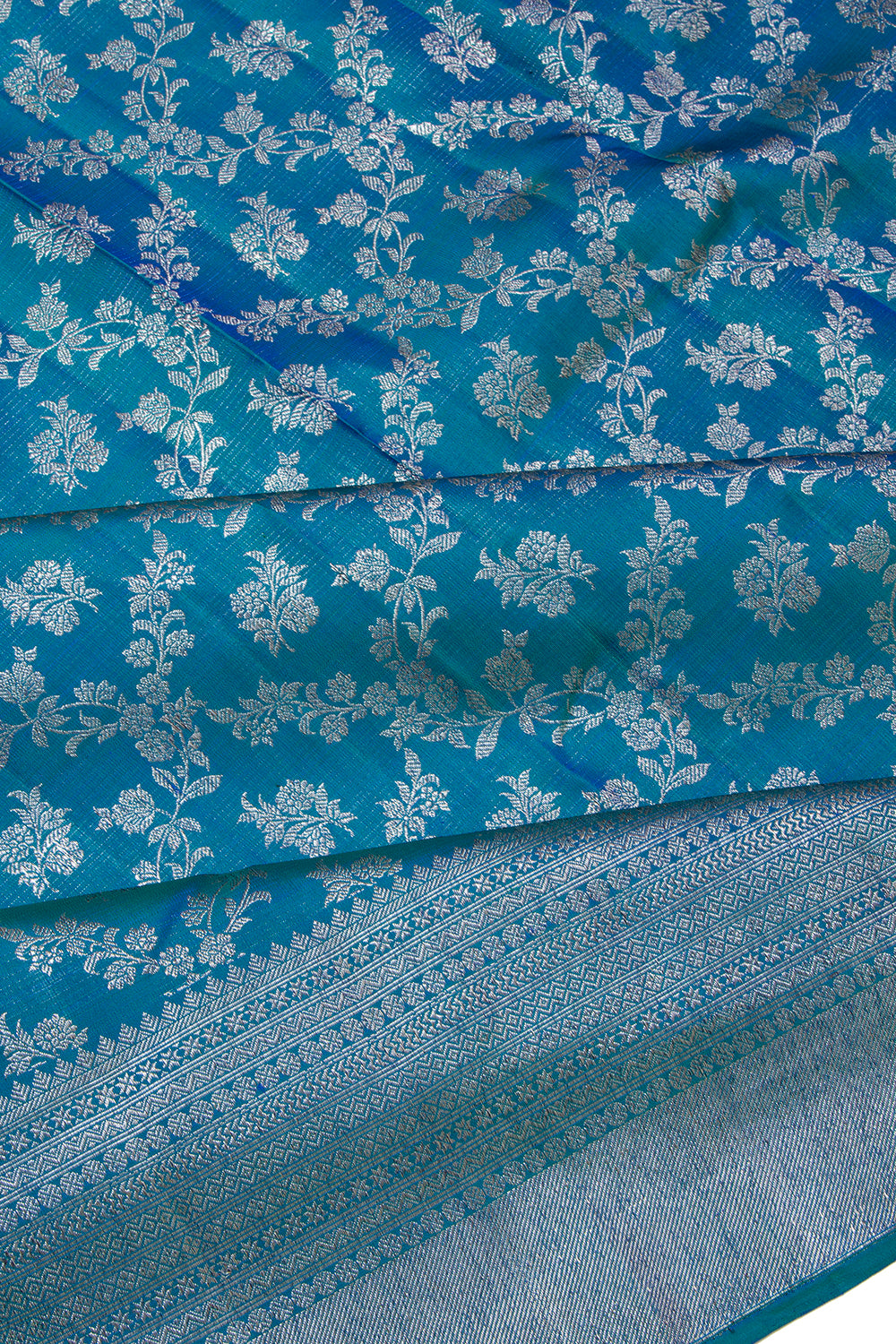 Kanchipuram Silk Jaal And Butta Teal Blue Saree