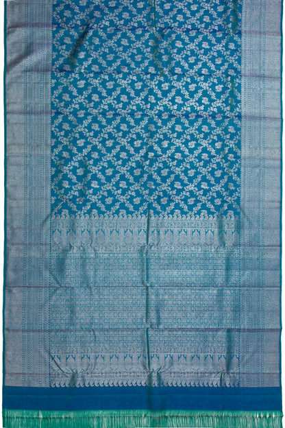 Kanchipuram Silk Jaal And Butta Teal Blue Saree