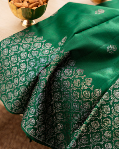 Taranga Kanchi Silk Antique Zari Butta Dark Green Saree With Rakhi and Gift Box