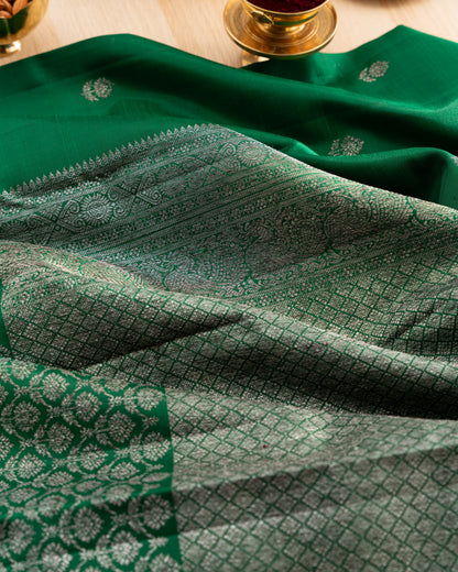 Taranga Kanchi Silk Antique Zari Butta Dark Green Saree With Rakhi and Gift Box