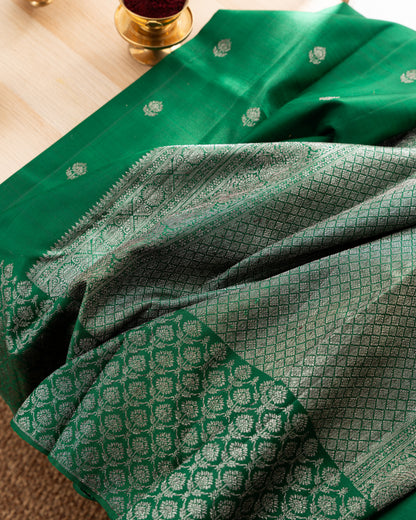 Taranga Kanchi Silk Antique Zari Butta Dark Green Saree With Rakhi and Gift Box