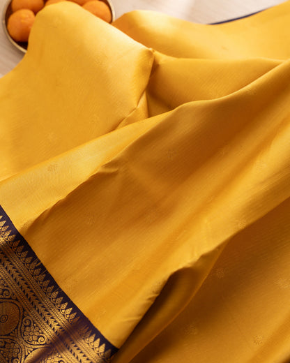Kanchipuram Silk Lines And Butta Yellow Saree With Rakhi and Gift Box