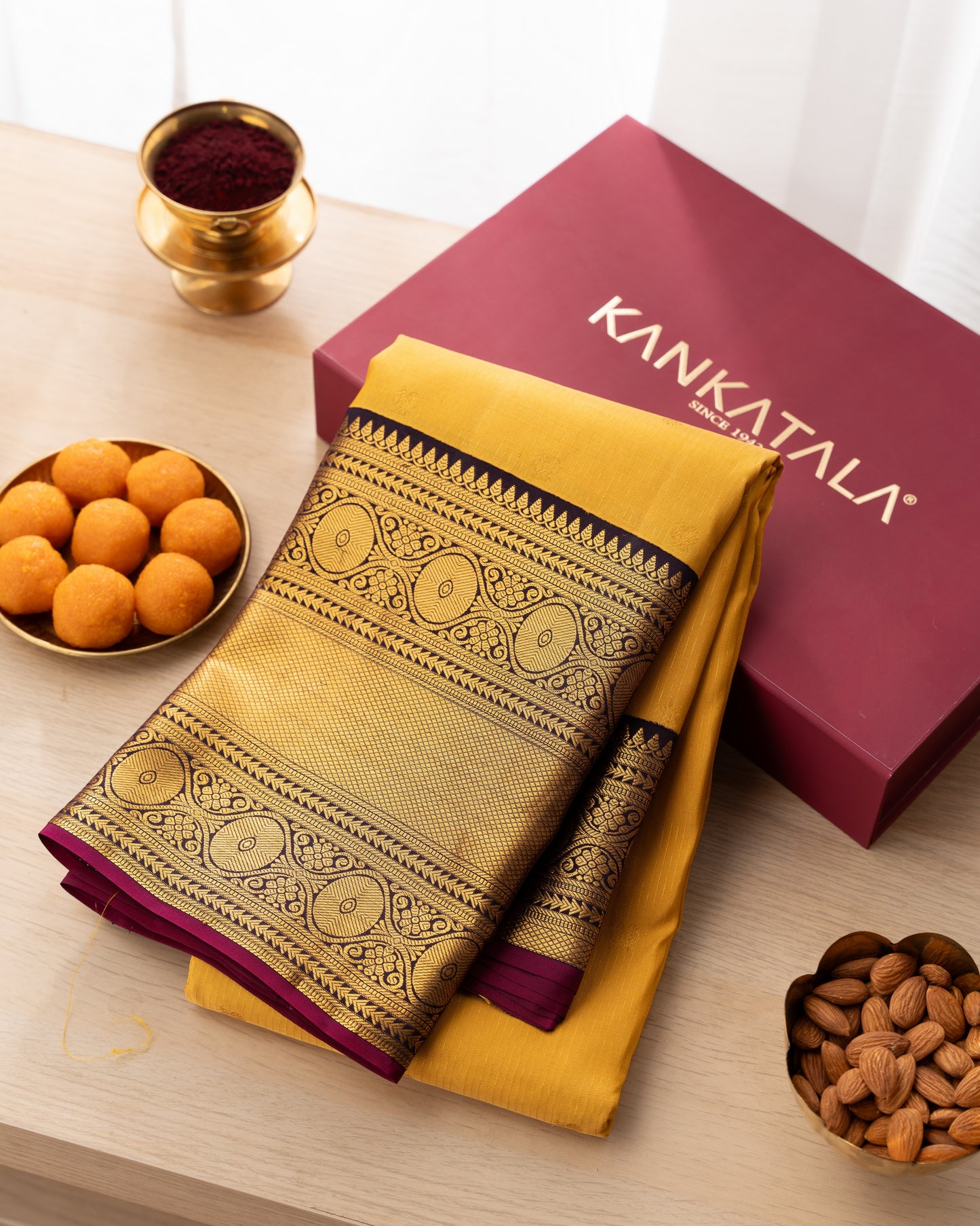 Kanchipuram Silk Lines And Butta Yellow Saree With Rakhi and Gift Box