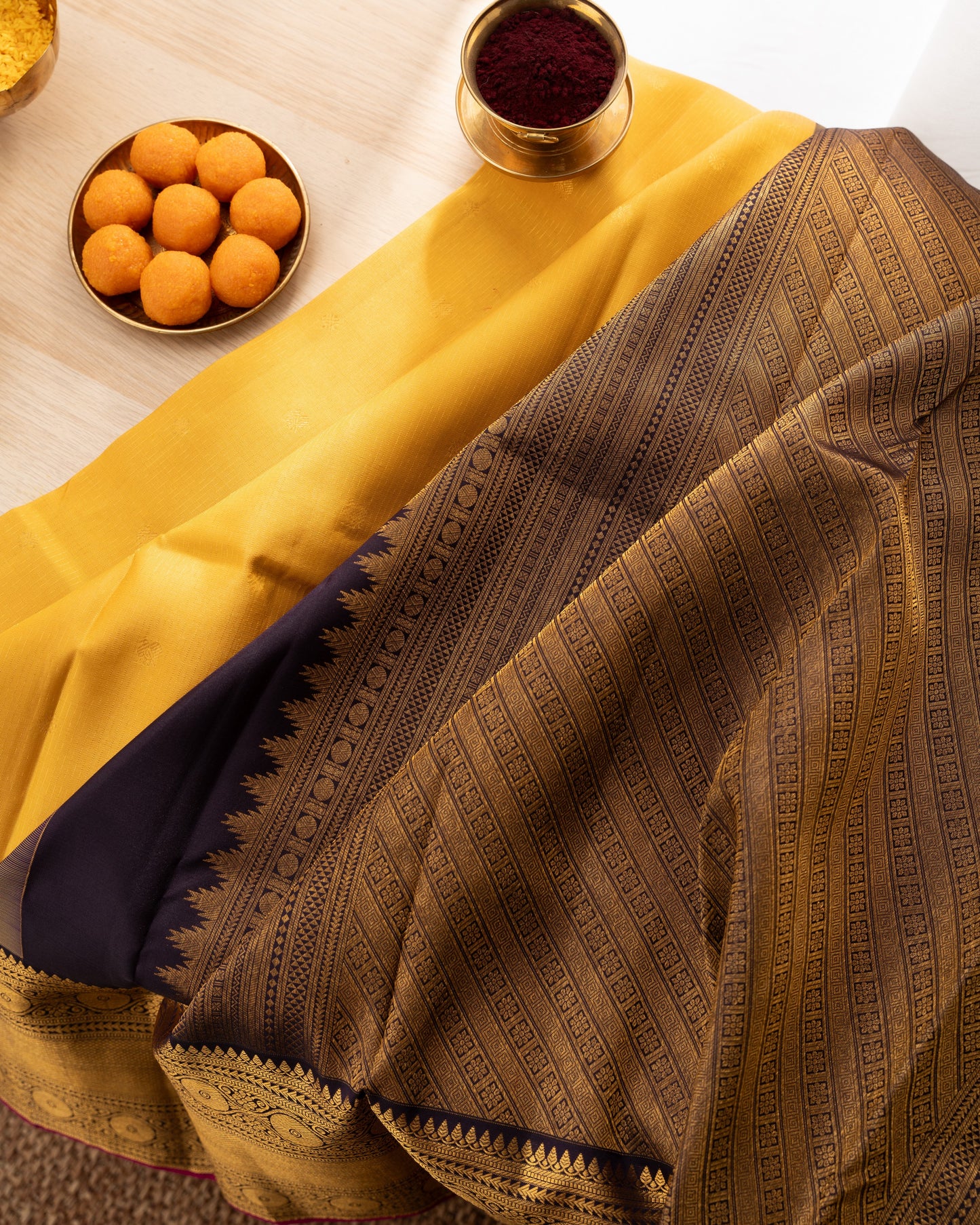 Kanchipuram Silk Lines And Butta Yellow Saree With Rakhi and Gift Box