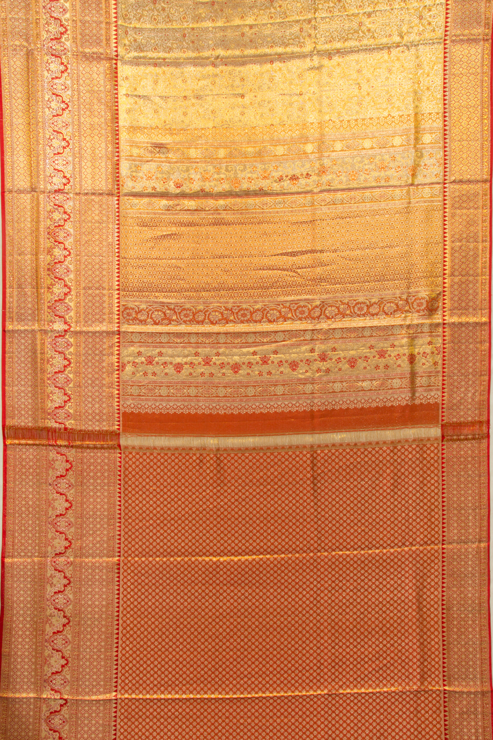 Taranga Kanchi Silk Tissue Brocade Gold Saree