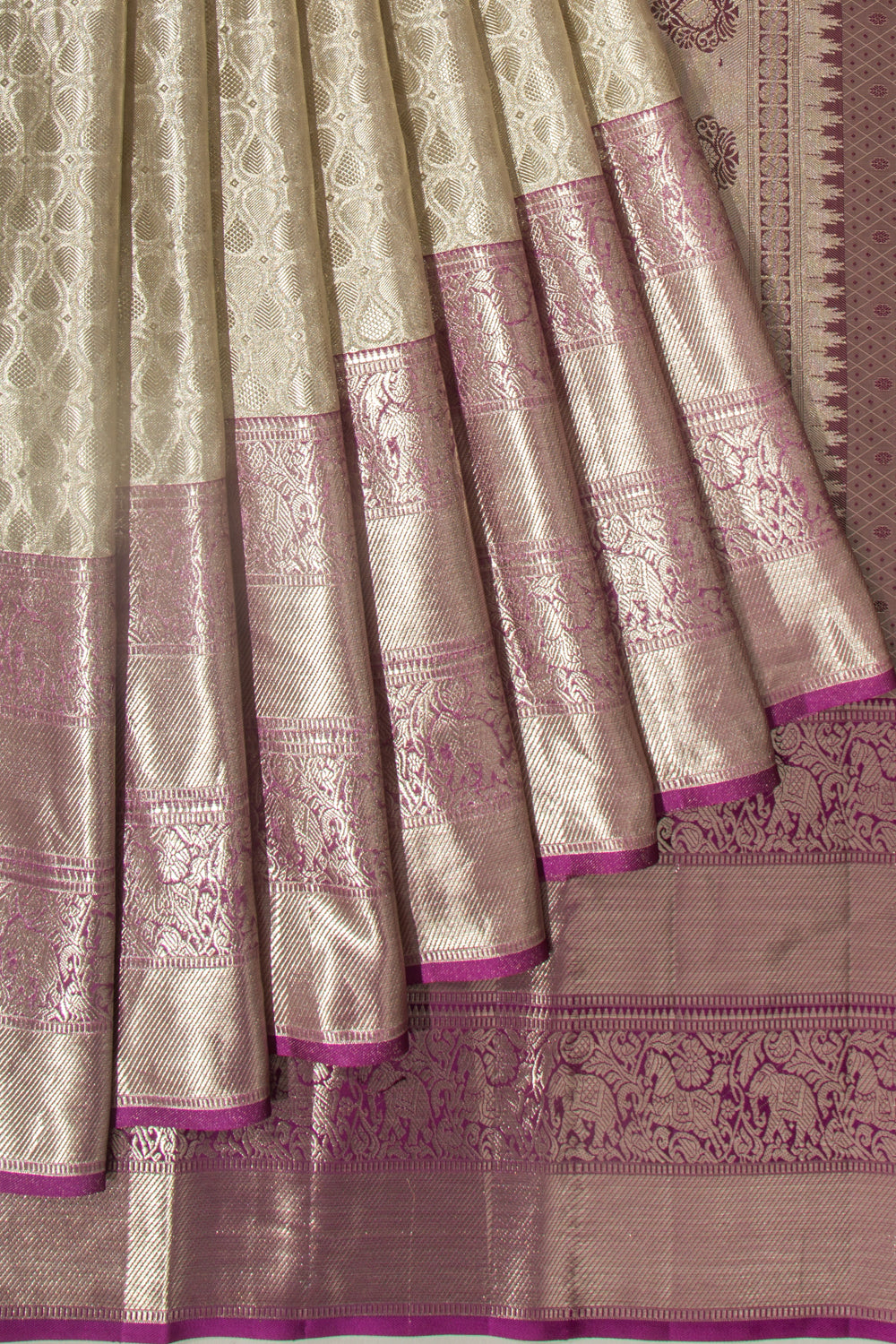 Taranga Kanchi Silk Tissue Brocade Silver Saree