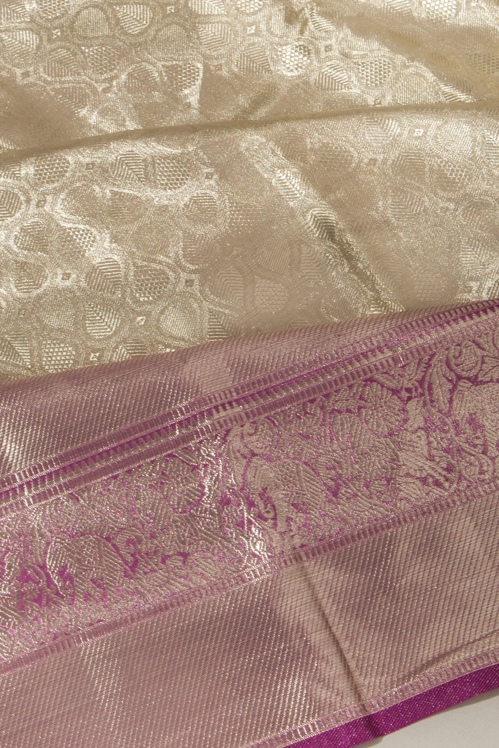 Taranga Kanchi Silk Tissue Brocade Silver Saree