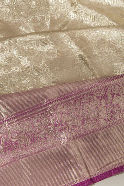 Taranga Kanchi Silk Tissue Brocade Silver Saree