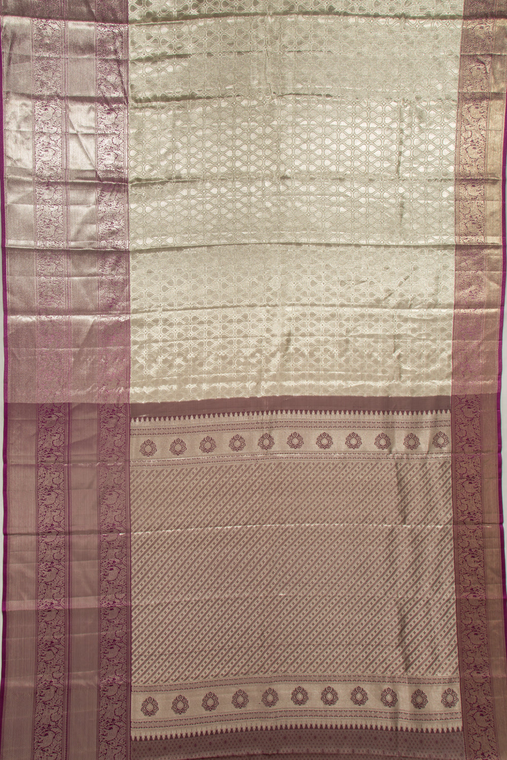 Taranga Kanchi Silk Tissue Brocade Silver Saree
