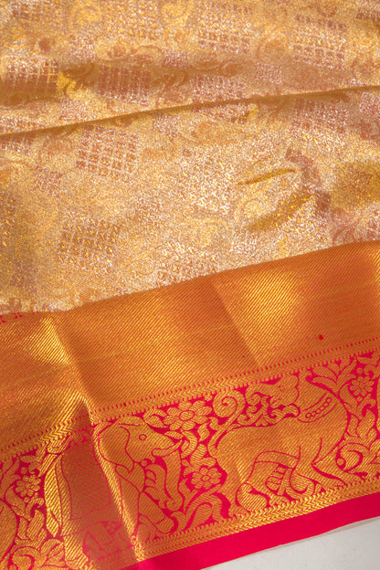 Taranga Kanchi Silk Tissue Brocade Gold Saree