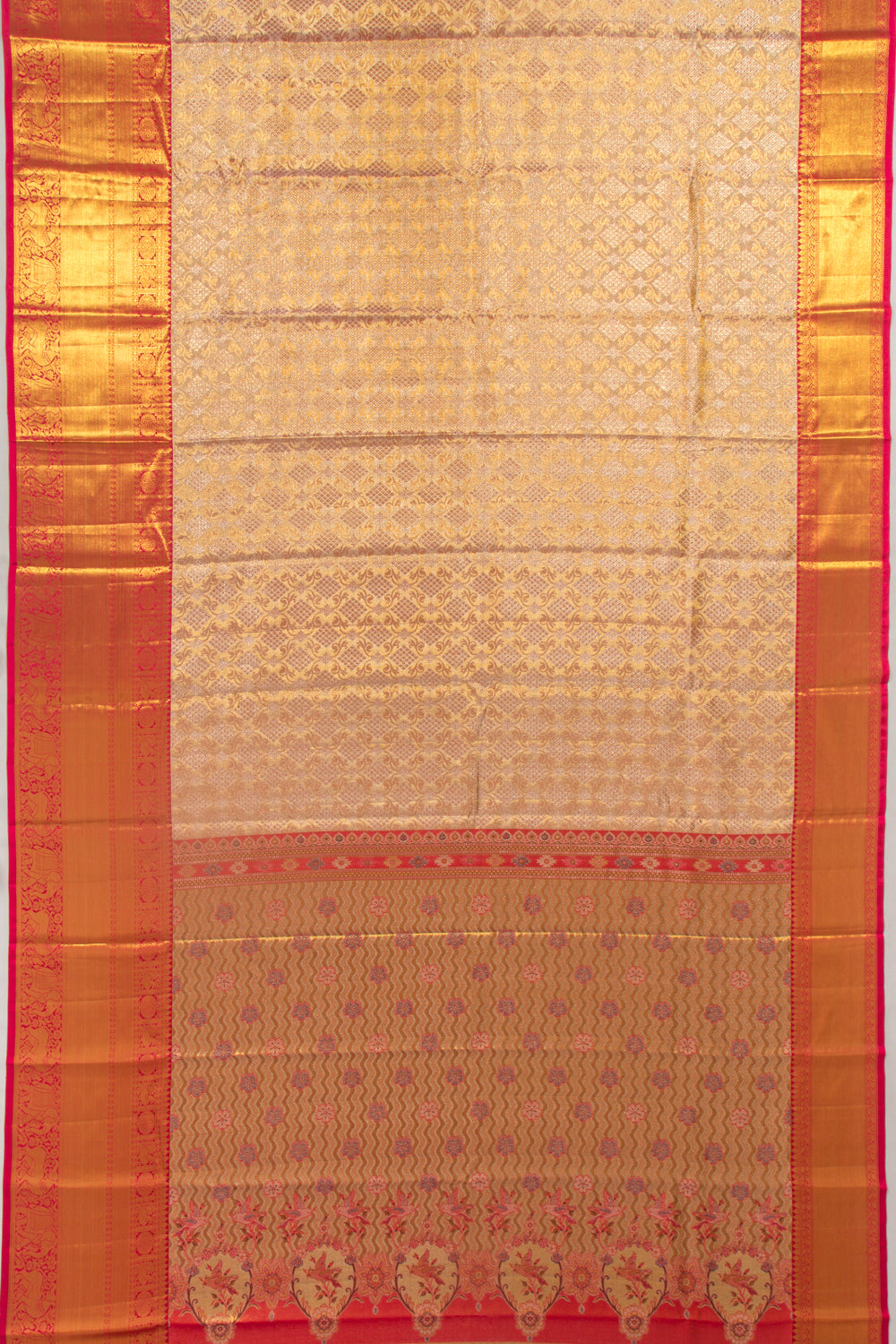 Taranga Kanchi Silk Tissue Brocade Gold Saree